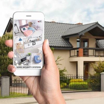 Athens vivint phone display of cctv live feed in front of a house